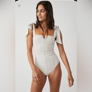 Intimately by Free People Lola Tie Shoulder
Bodysuit size Medium in Cream/Tan